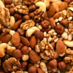تأثیر جایگزینی تنقلات پرکربوهیدرات با آجیل در کاهش میل به غذا در جوانان